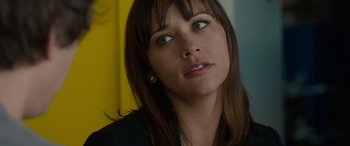 Movie still from “Celeste & Jesse Forever” (2012), directed by Lee Toland Krieger – A person with long brown hair; Close Up shot, Over the shoulder angle