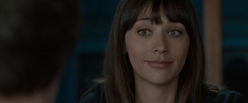 Movie still from “Celeste & Jesse Forever” (2012), directed by Lee Toland Krieger – A woman's face in a dark room; Close Up shot, Over the shoulder angle