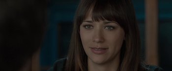 Movie still from “Celeste & Jesse Forever” (2012), directed by Lee Toland Krieger – A woman's face in a dark room; Close Up shot, Over the shoulder angle