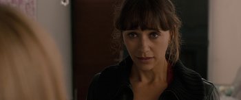 Movie still from “Celeste & Jesse Forever” (2012), directed by Lee Toland Krieger – A person wearing a black jacket; Close Up shot, Over the shoulder angle