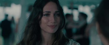 Movie still from “Celeste & Jesse Forever” (2012), directed by Lee Toland Krieger – A person with long dark hair; Close Up shot, Over the shoulder angle