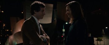 Movie still from “Celeste & Jesse Forever” (2012), directed by Lee Toland Krieger – A man and a woman standing next to each other; Medium shot, Over the shoulder angle