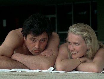 Movie still from “Cousin cousine” (1975), directed by Jean-Charles Tacchella – A man and a woman laying on the ground; Close Up shot, Low angle