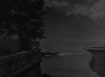 Movie still from “Dodsworth” (1936), directed by William Wyler – A black and white photo of a boat on the water; Extreme Wide shot, Low angle
