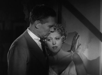 Movie still from “Dodsworth” (1936), directed by William Wyler – A man and a woman standing next to each other; Close Up shot, Low angle