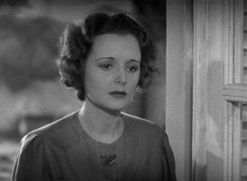 Movie still from “Dodsworth” (1936), directed by William Wyler – An old black and white photo of a woman looking at the camera; Close Up shot, High angle