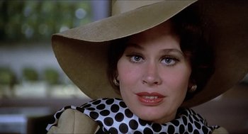 Movie still from “Family Plot” (1976), directed by Alfred Hitchcock – A person wearing a hat; Close Up shot, Low angle