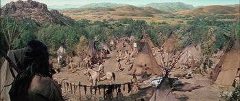 Movie still from “Flaming Star” (1960), directed by Don Siegel – An image of an indian village in the wild west; Extreme Wide shot, High angle