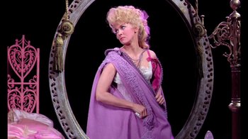 Movie still from “Frankie and Johnny” (1966), directed by Frederick De Cordova – A woman dressed as a princess in front of a mirror; Medium shot, Low angle