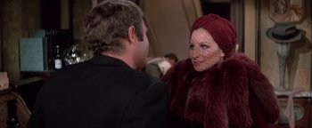 Movie still from “Funny Lady” (1975), directed by Herbert Ross – A man and a woman talking to each other; Close Up shot, Over the shoulder angle