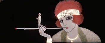 Movie still from “Funny Lady” (1975), directed by Herbert Ross – A woman in a white dress is standing next to a woman in a red hat; Wide shot, Low angle