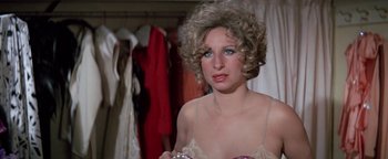 Movie still from “Funny Lady” (1975), directed by Herbert Ross – A person wearing a bra; Close Up shot, Over the shoulder angle