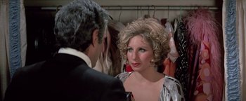 Movie still from “Funny Lady” (1975), directed by Herbert Ross – A man and a woman are in a dressing room; Close Up shot, Over the shoulder angle