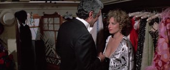 Movie still from “Funny Lady” (1975), directed by Herbert Ross – A man and a woman are holding hands; Medium shot, Over the shoulder angle