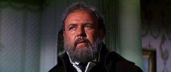 Movie still from “Hawaii” (1966), directed by George Roy Hill – An older man with a beard and a mustache; Close Up shot, Low angle