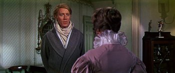 Movie still from “Hawaii” (1966), directed by George Roy Hill – A man and a woman looking at each other in front of a mirror; Medium shot, Over the shoulder angle