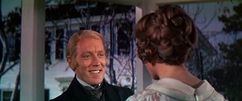 Movie still from “Hawaii” (1966), directed by George Roy Hill – A man and a woman talking to each other; Close Up shot, Over the shoulder angle