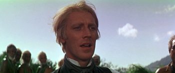 Movie still from “Hawaii” (1966), directed by George Roy Hill – A person with long blonde hair; Close Up shot, Low angle