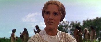 Movie still from “Hawaii” (1966), directed by George Roy Hill – A person wearing a white shirt; Close Up shot, Low angle