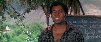 Movie still from “Hawaii” (1966), directed by George Roy Hill – A person wearing a shirt; Close Up shot, Over the shoulder angle