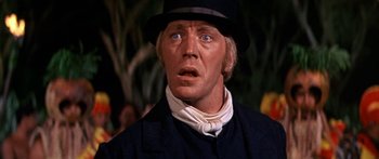 Movie still from “Hawaii” (1966), directed by George Roy Hill – A man with blue eyes wearing a black hat; Close Up shot, Low angle