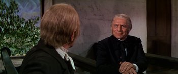 Movie still from “Hawaii” (1966), directed by George Roy Hill – An older man is looking at himself in the mirror; Medium shot, Over the shoulder angle