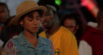 Movie still from “Jason's Lyric” (1994), directed by Doug McHenry – A man and a woman standing next to each other; Close Up shot, Over the shoulder angle