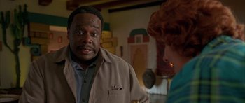 Movie still from “Johnson Family Vacation” (2004), directed by Christopher Erskin – A man and a woman are talking in a room; Close Up shot, Over the shoulder angle