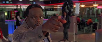 Movie still from “Johnson Family Vacation” (2004), directed by Christopher Erskin – A man points at the camera with his finger; Close Up shot, Low angle