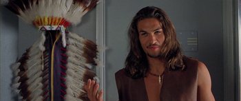 Movie still from “Johnson Family Vacation” (2004), directed by Christopher Erskin – A person with long brown hair; Close Up shot, Over the shoulder angle