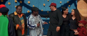 Movie still from “Johnson Family Vacation” (2004), directed by Christopher Erskin – Two men talking to each other on a stage; Medium shot, High angle