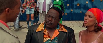 Movie still from “Johnson Family Vacation” (2004), directed by Christopher Erskin – A man in a leather jacket and a colorful shirt; Close Up shot, Low angle