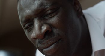 Movie still from “Mood Indigo” (2013), directed by Michel Gondry – A man's face with his eyes closed; Extreme Close Up shot, Low angle