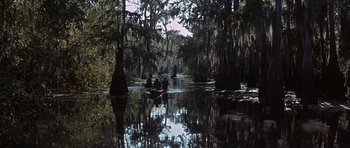 Movie still from “Nevada Smith” (1966), directed by Henry Hathaway – A group of people on a boat in a lake; Extreme Wide shot, High angle