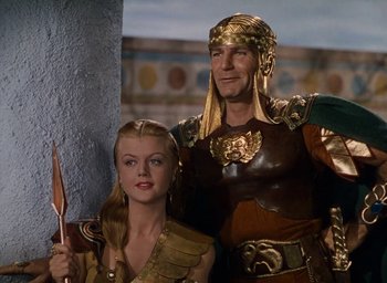 Movie still from “Samson and Delilah” (1949), directed by Cecil B. DeMille – A man and a woman dressed in ancient roman clothing; Medium shot, Low angle