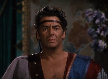 Movie still from “Samson and Delilah” (1949), directed by Cecil B. DeMille – A person wearing a costume; Close Up shot, Over the shoulder angle