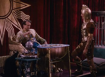 Movie still from “Samson and Delilah” (1949), directed by Cecil B. DeMille – A group of men dressed in costumes playing a game; Wide shot, High angle