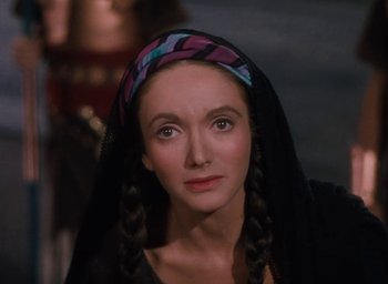 Movie still from “Samson and Delilah” (1949), directed by Cecil B. DeMille – A person wearing a headscarf; Close Up shot, Over the shoulder angle