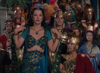Movie still from “Samson and Delilah” (1949), directed by Cecil B. DeMille – A group of people dressed up in costumes; Medium shot, High angle