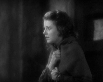 Movie still from “Street Angel” (1928), directed by Frank Borzage – An old photo of a woman looking at the camera; Close Up shot, High angle