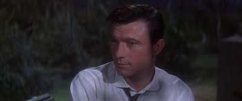 Movie still from “Summer and Smoke” (1961), directed by Peter Glenville – A person wearing a shirt and a tie; Close Up shot, High angle