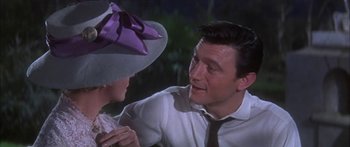 Movie still from “Summer and Smoke” (1961), directed by Peter Glenville – A man and a woman talking to each other; Close Up shot, Over the shoulder angle