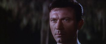 Movie still from “Summer and Smoke” (1961), directed by Peter Glenville – A man's face in the dark; Close Up shot, Low angle