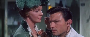 Movie still from “Summer and Smoke” (1961), directed by Peter Glenville – A woman and a man looking at each other; Close Up shot, Over the shoulder angle