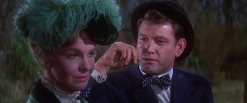 Movie still from “Summer and Smoke” (1961), directed by Peter Glenville – A man and a woman are looking at each other; Close Up shot, Over the shoulder angle
