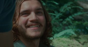 Movie still from “Taking Woodstock” (2009), directed by Ang Lee – A person with long hair; Close Up shot, Over the shoulder angle