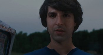 Movie still from “Taking Woodstock” (2009), directed by Ang Lee – A person wearing a blue shirt; Close Up shot, Low angle
