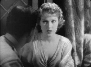 Movie still from “The Most Dangerous Game” (1932), directed by Irving Pichel – An old black and white photo of a woman and a man; Close Up shot, High angle