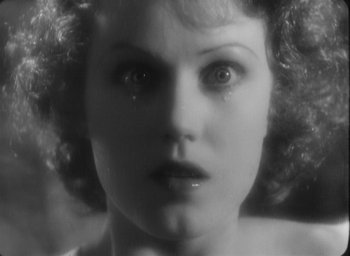 Movie still from “The Most Dangerous Game” (1932), directed by Irving Pichel – A woman's face with tears coming out of her eyes; Close Up shot, Low angle