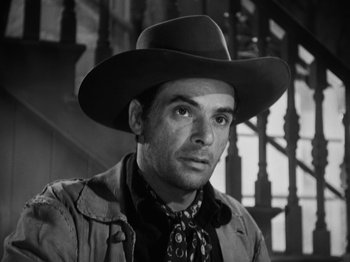 Movie still from “The Ox-Bow Incident” (1942), directed by William A. Wellman – A black and white photo of a man wearing a cowboy hat; Close Up shot, Low angle
